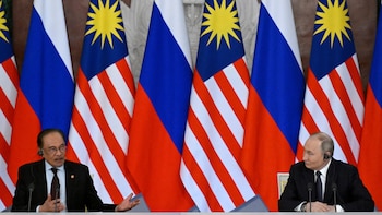 Russian President Vladimir Putin meets